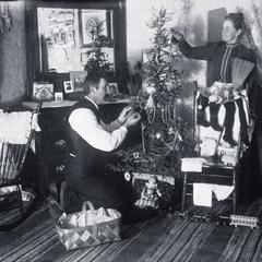 Alex and Florentina Krueger decorate their Christmas tree