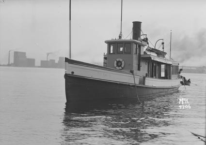Tug Ellen D. with Rowboat Alongside