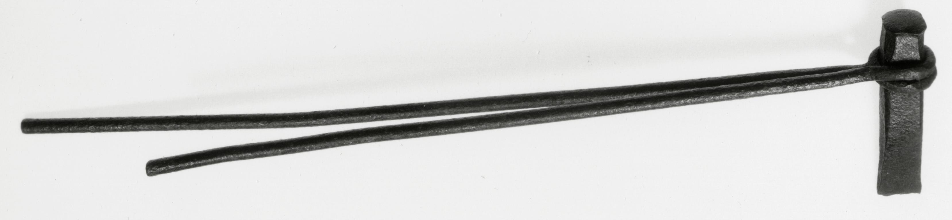 Black and white photograph of a blacksmith's chisel (hot set).