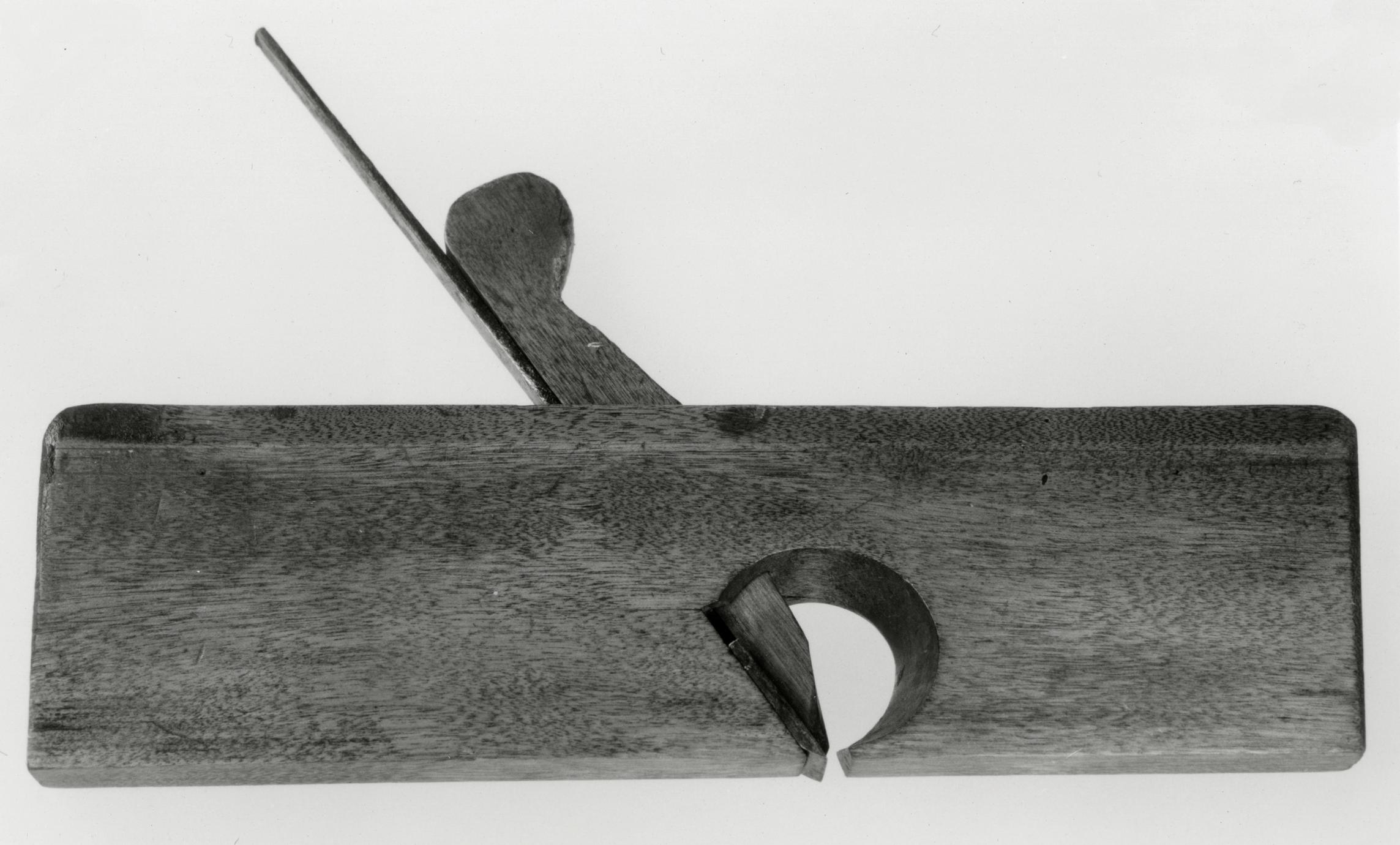 Black and white photograph of a square-mounted rabbet plane.
