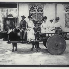 U.S. officers and women on carabao, 1900-1901