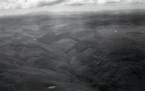 Aerial view of the eastern portion of the Boloven Plateau looking towards Phou Luang mountain in Attapu Province