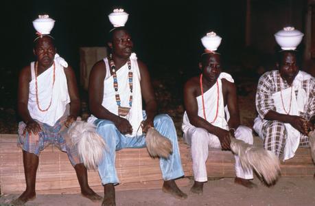 Men Seated with Pots on Heads During Etafa Ceremony