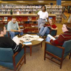 Students socialize in the library
