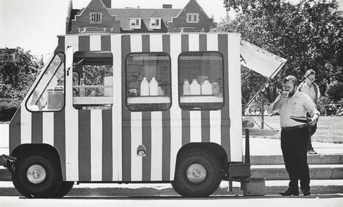 Striped food cart on Library Mall