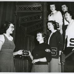 Women's Athletic Association member receiving a letter award