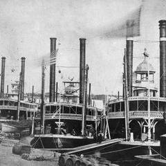 Bow view of three packets docked at St. Paul, Minnesota
