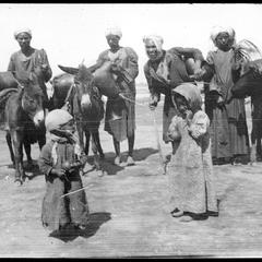 Pig skins of water on donkeys