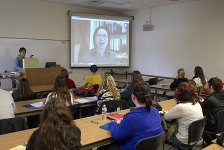 College students in a Skype call during class