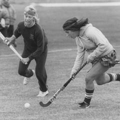 Two women's field hockey team members