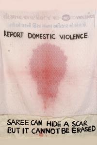 Report domestic violence; Saree can hide a scar but it cannot be erased