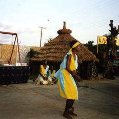 Dancers in yellow and blue
