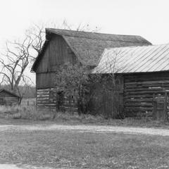 Hog barn (background)