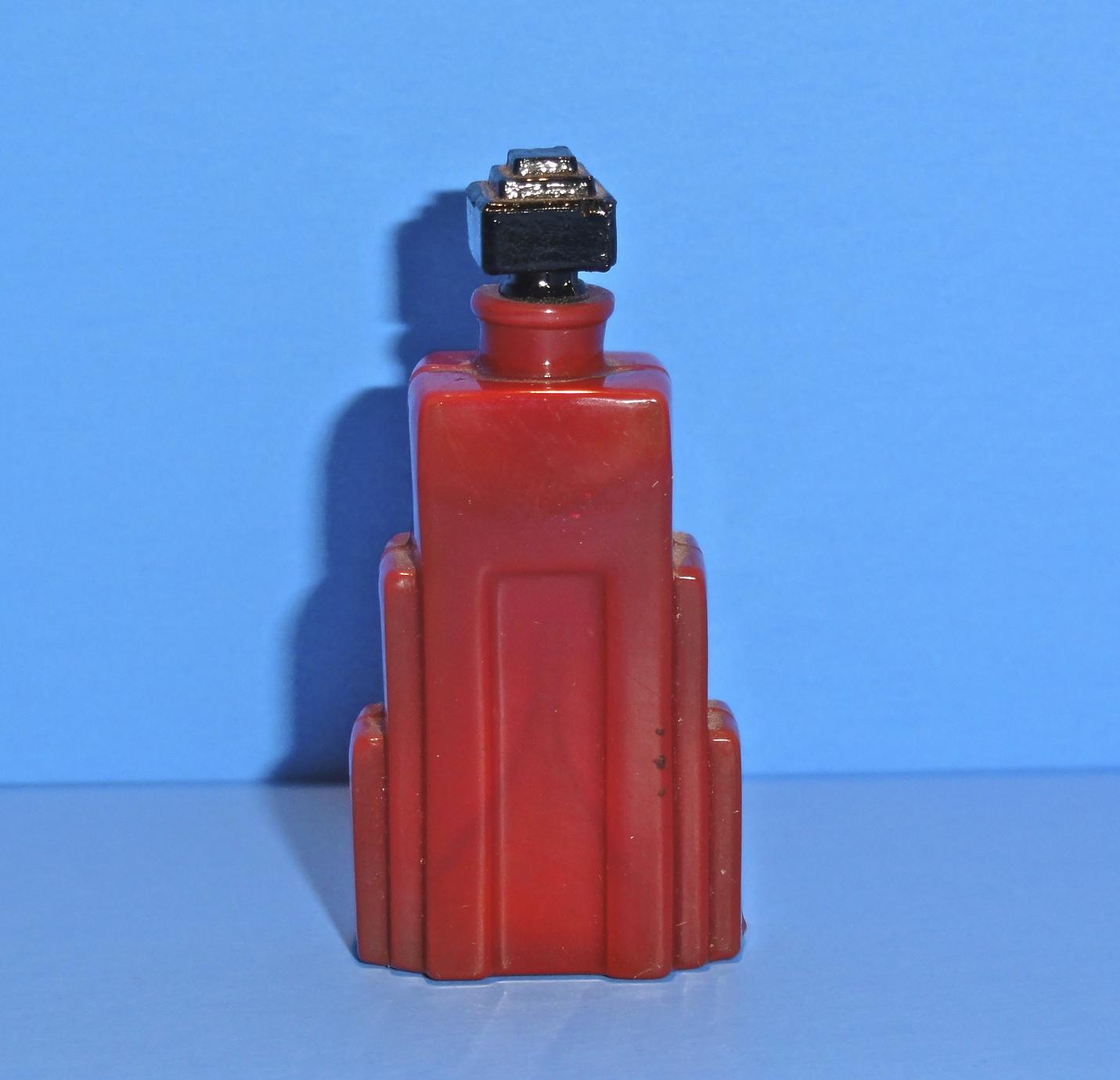 Opaque red glass perfume bottle - UWDC - UW-Madison Libraries