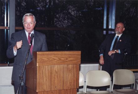 Paul Collins speaking during special event
