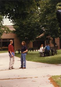 Students talking in courtyard