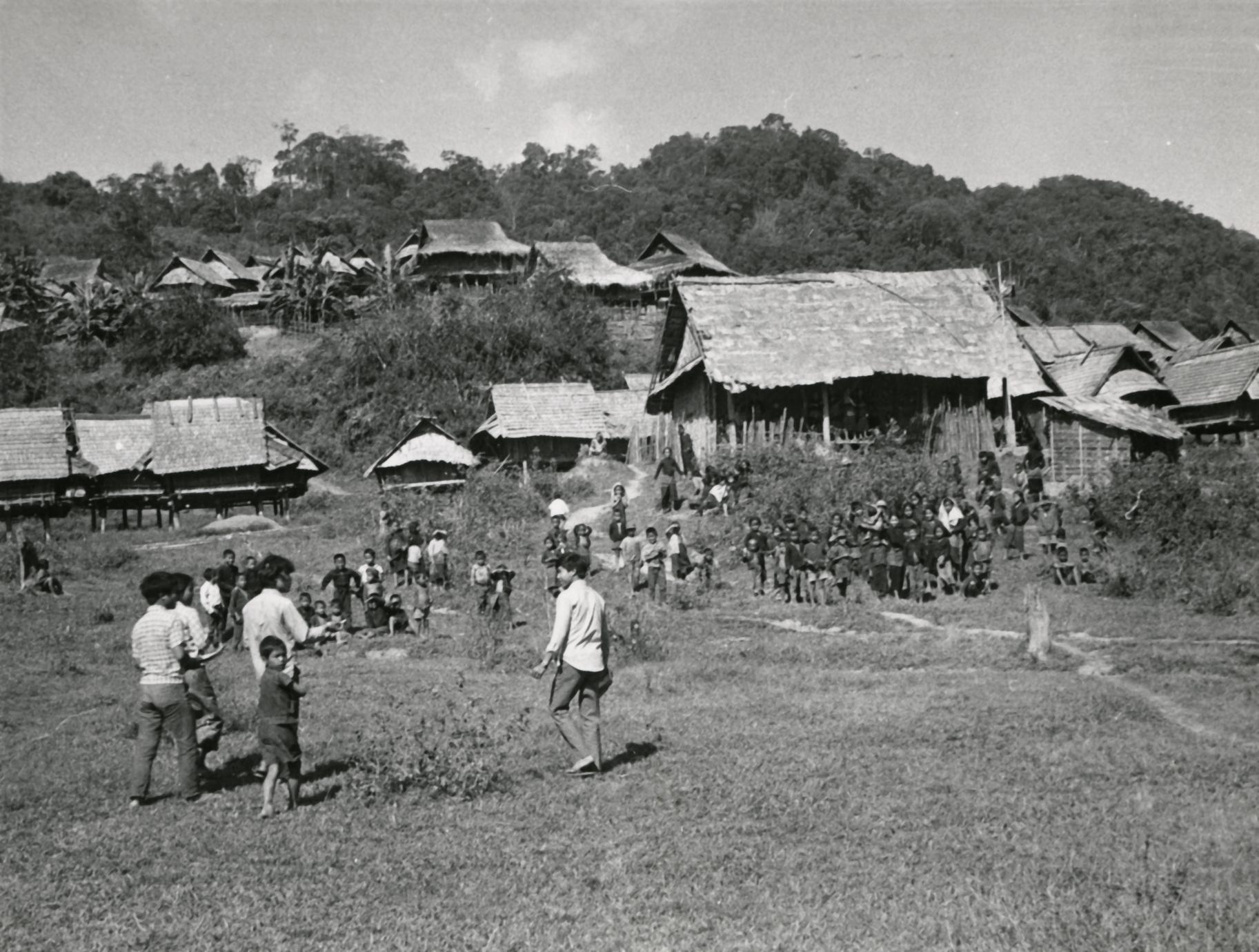 Adults and children in the Khmu' village of Pang Kwen in Houa Khong Province