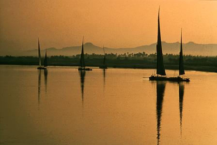 Feluccas (Sailing Boats) on Nile with Mountains Behind
