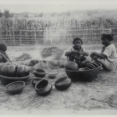 Girls preparing pottery, Ilocos Norte, pre-1927