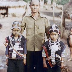 Akha children with their father in the village of Phate in Houa Khong Province