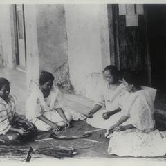 Embroidering a Tikug mat, 1905-1915