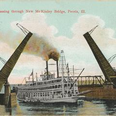 Steamer J.S. passing through new McKinley Bridge, Peoria, Ill.