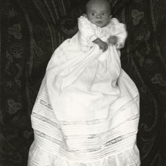 Baby in christening gown