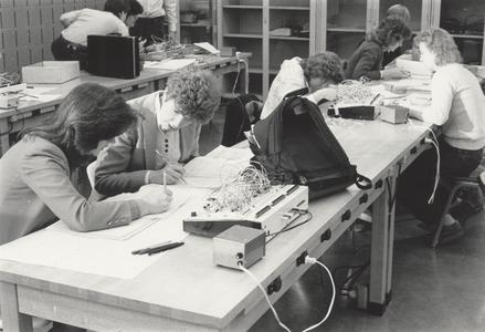 Students working in an electronics laboratory