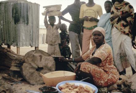Woman Deep-Frying and Selling Kosai on the Road to the Lycee, Zinder