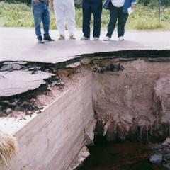Flooding and road collapse