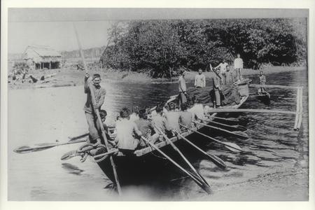 Men in rowboat, ca. 1920-1930