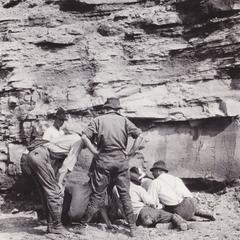 Group of geologists in a shale pit