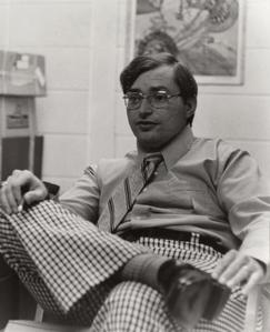 Theatre professor Doug Rosentrater sitting at his desk
