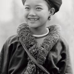 A Yao (Iu Mien) girl in traditional clothing in Houa Khong Province