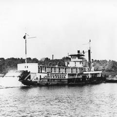 Stern side view of the John W. Weeks pushing barge