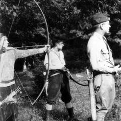 Aldo Leopold and others with bows and arrows