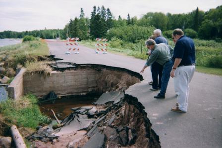 Flooding and road collapse