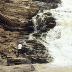 Harrison and Isoun Niece climbing waterfall