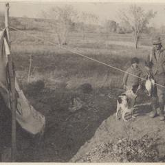 Aldo, Starker and "Flick" in Rio Grande camp, December 1920