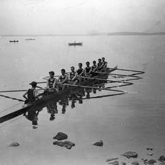 Crew team rowing