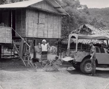 IVS jeep parked in front of Laven house in Houei Kong Cluster in Attapu Province