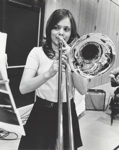 Student playing a trombone
