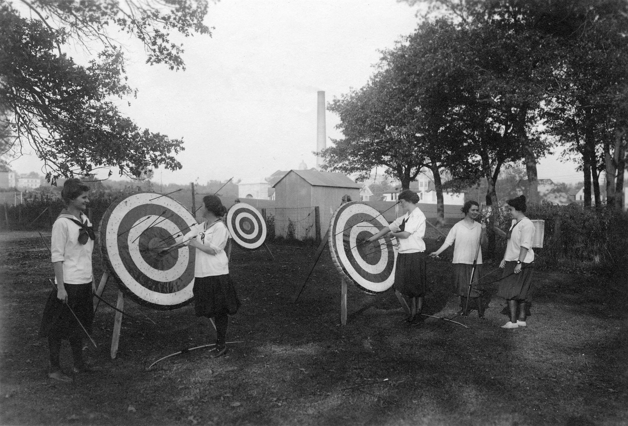 ‎Women's archery group with targets UWDC UWMadison Libraries