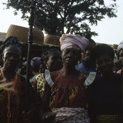 Chief priest with group of women