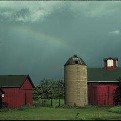 Barn house with rainbow