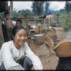 Lao woman steaming rice