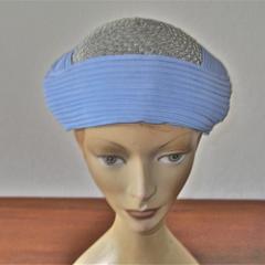 Turban toque style hat in silver and light blue