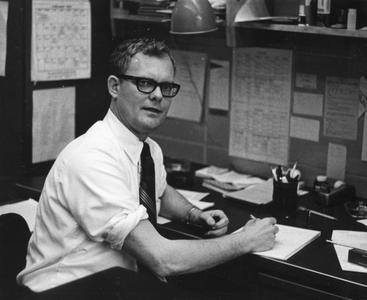 Dr. James C. Pettersen at desk