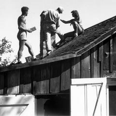 Pepper Jackson, Aldo Leopold, and Estella fixing the chimney