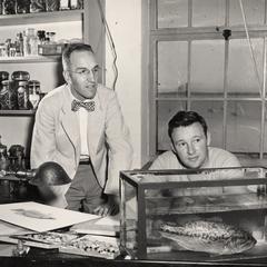 Arthur D. Hasler and Douglas Tibbits with fish